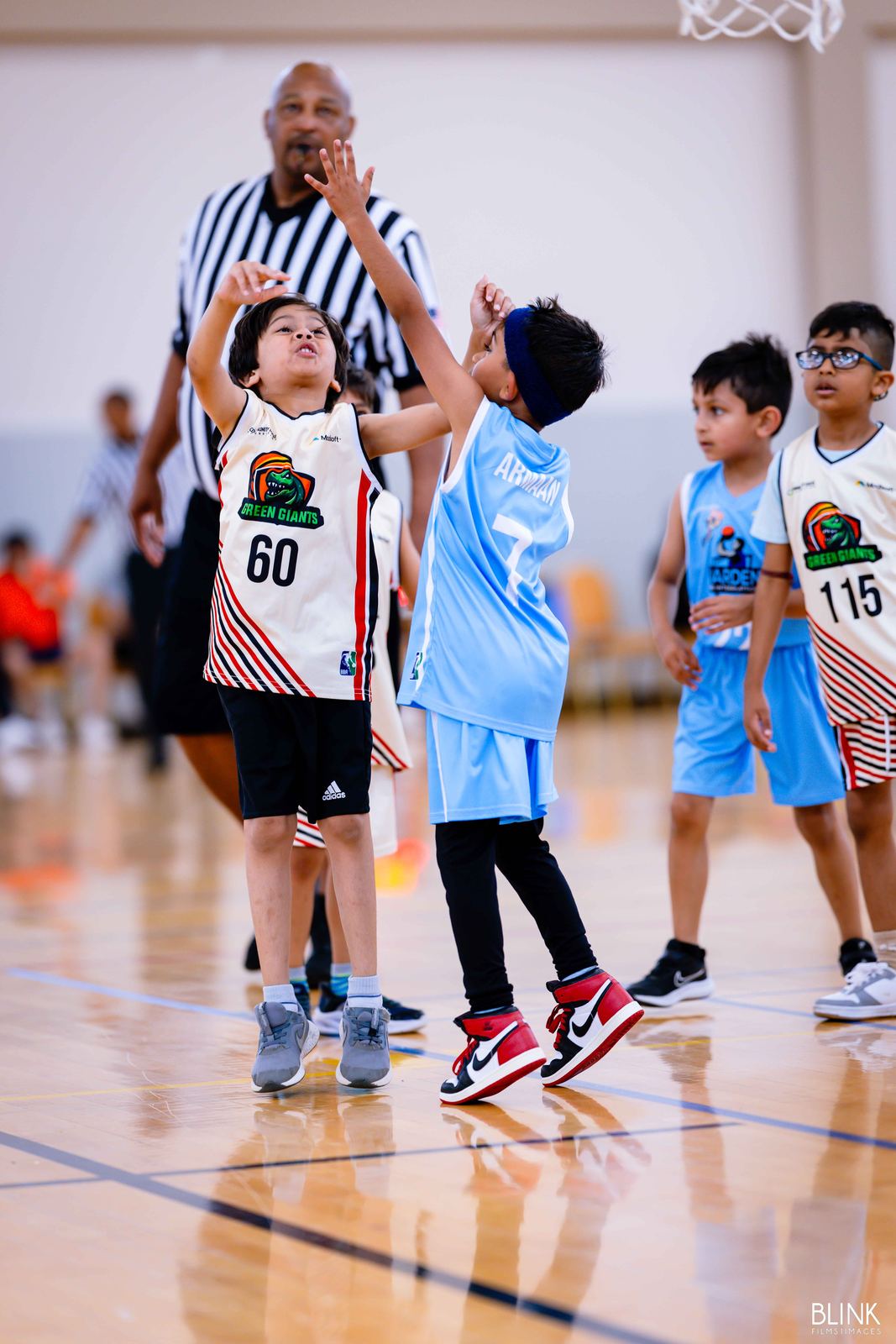 Two players jump for the ball in a 2025 Li'l Bonanza game