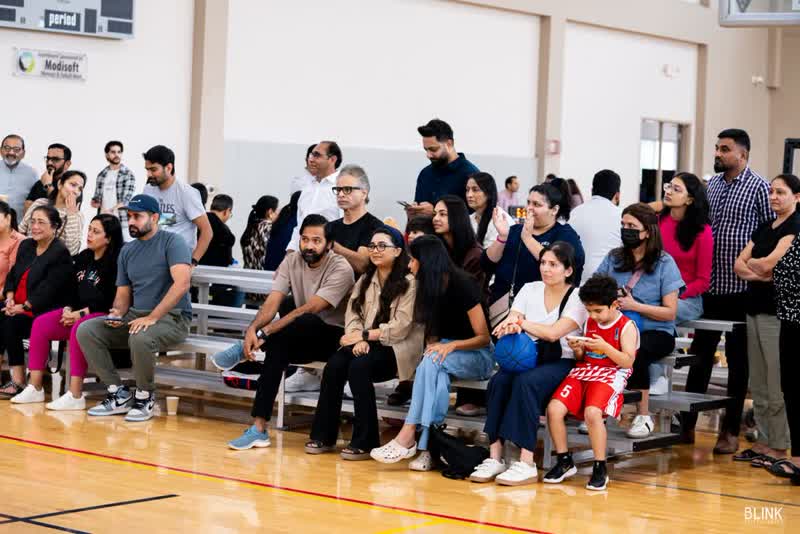 Families sit in the bleachers on Season 7 opening Sunday